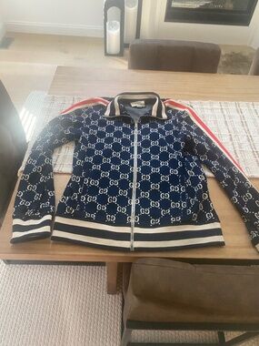Gucci zip up with gucci garment bag